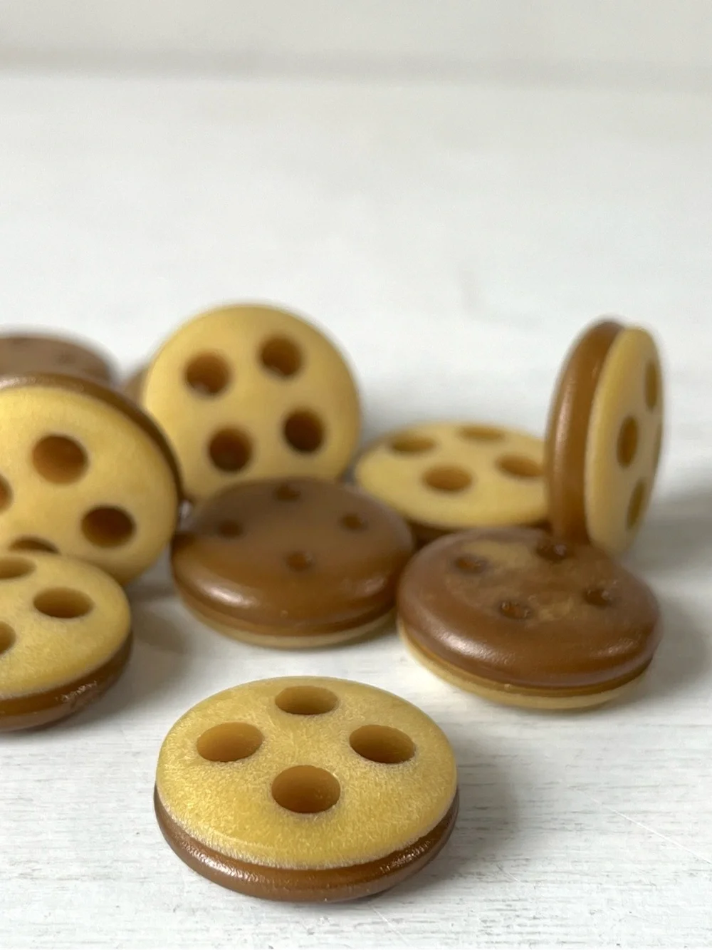 11 Unusual Vintage Round Plastic 4 hole Buttons w Groove Offbeat Yellow Ochre